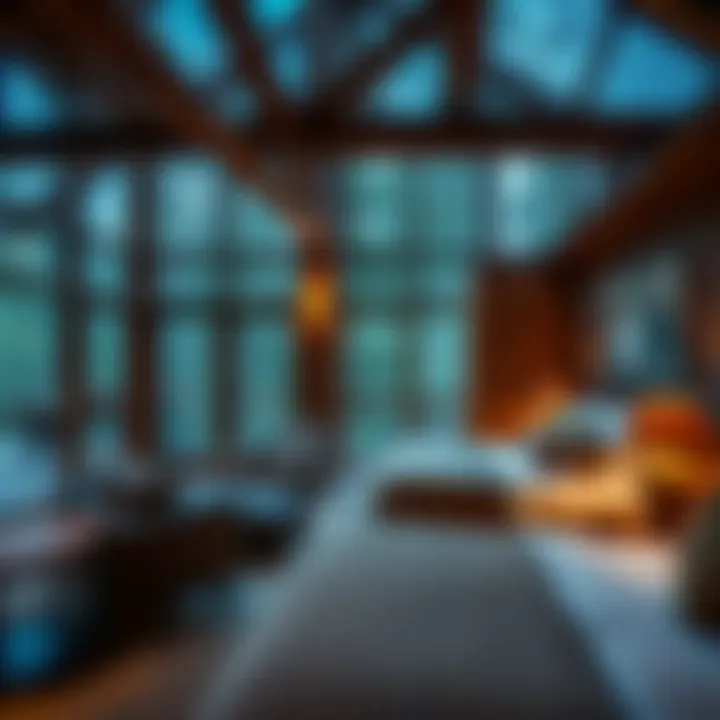Luxurious King Billy Suite interior with rustic wooden beams, cozy furnishings, and large windows overlooking dense forest